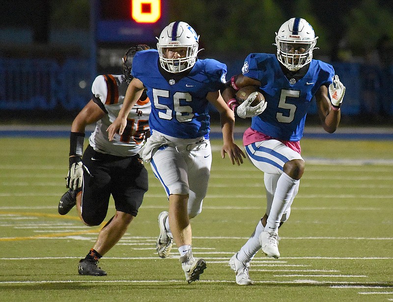 Staff photo by Matt Hamilton / Ringgold's Jevon Coney runs with the ball after making a catch during an Oct. 8 home win against LaFayette. Coney and the Tigers came up short Friday night at Rockmart, losing 18-6 with the GHSA Region 6-AAA championship at stake. It's Ringgold's first loss of the year.