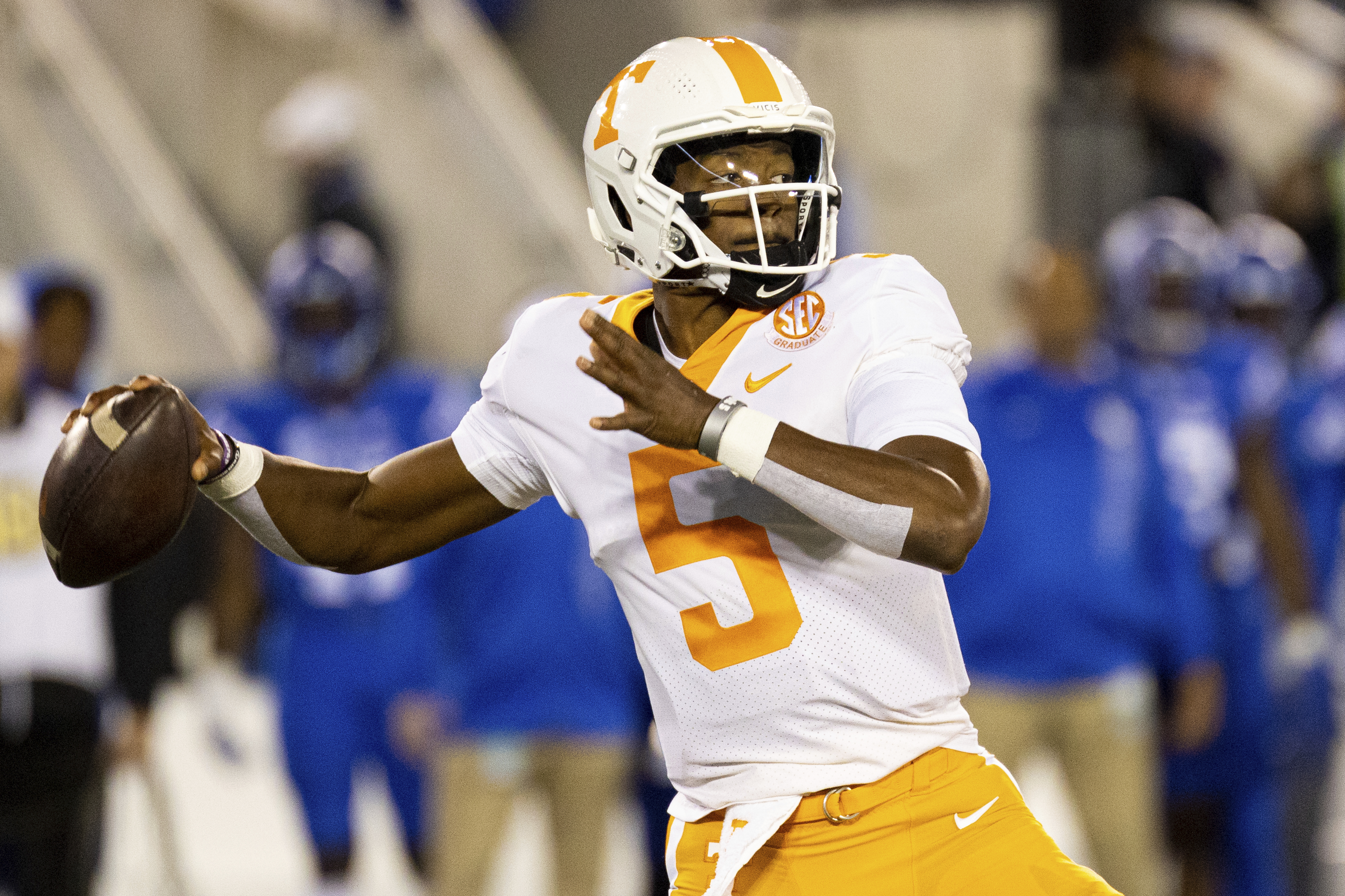 AP photo by Michael Clubb / Tennessee quarterback Hendon Hooker passes during Saturday night's game against Kentucky in Lexington.