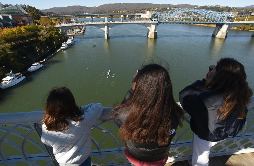 Staff Photo by Matt Hamilton / Onlookers watch from the Walnut Street Bridge on Sunday November 7, 2021 during the Head of the Hooch regatta.