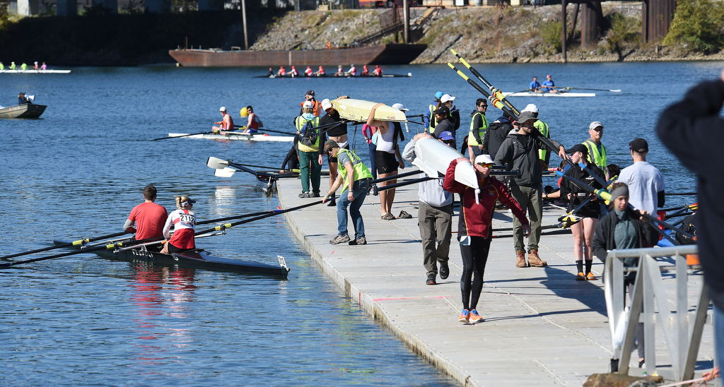 Staff Photo by Matt Hamilton / Teams take their boats out of the water after their races on Sunday November 7, 2021 during the Head of the Hooch regatta.
