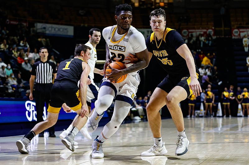 Staff photo by Troy Stolt / Chattanooga Mocs forward Silvio De Sousa (22) drives to the basket during the UTC men's basketball exhibition game against College of Wooster at McKenzie Arena on Thursday, Nov. 4, 2021 in Chattanooga, Tenn.