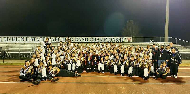 Contributed photo by Melissa Barrett / The Signal Corps marching band poses for a photo after winning the Tennessee Division II State Marching Band Championship on Saturday.