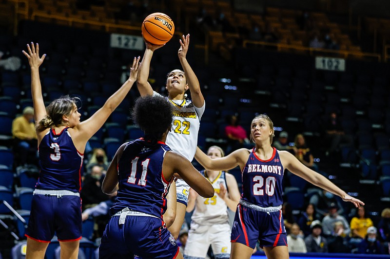 Staff photo by Troy Stolt /UTC guard Brooke Hampel (22) shoots the ball during the first half of the UTC women's basketball season opening game against Belmont at McKenzie Arena on Tuesday, Nov. 9, 2021 in Chattanooga, Tenn.