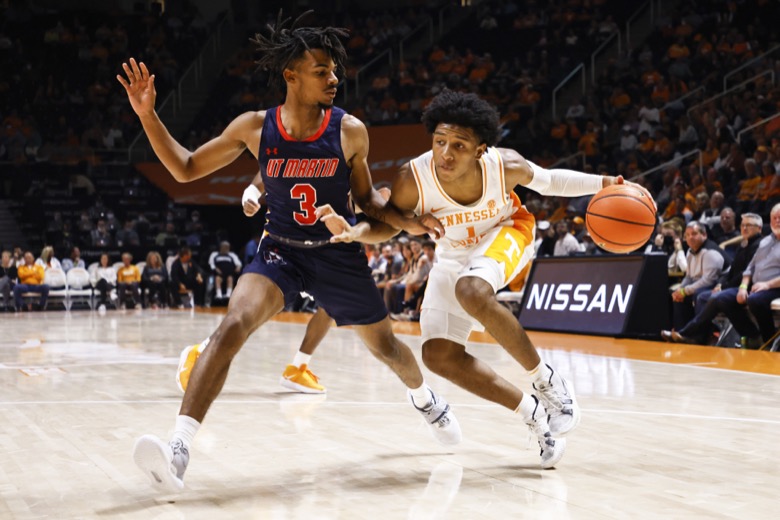 Tennessee guard Kennedy Chandler (1) drives against Tennessee-Martin guard Mikel Henderson (3) during an NCAA college basketball game Tuesday, Nov. 9, 2021, in Knoxville, Tenn. Tennessee won 90-62. (AP Photo/Wade Payne)