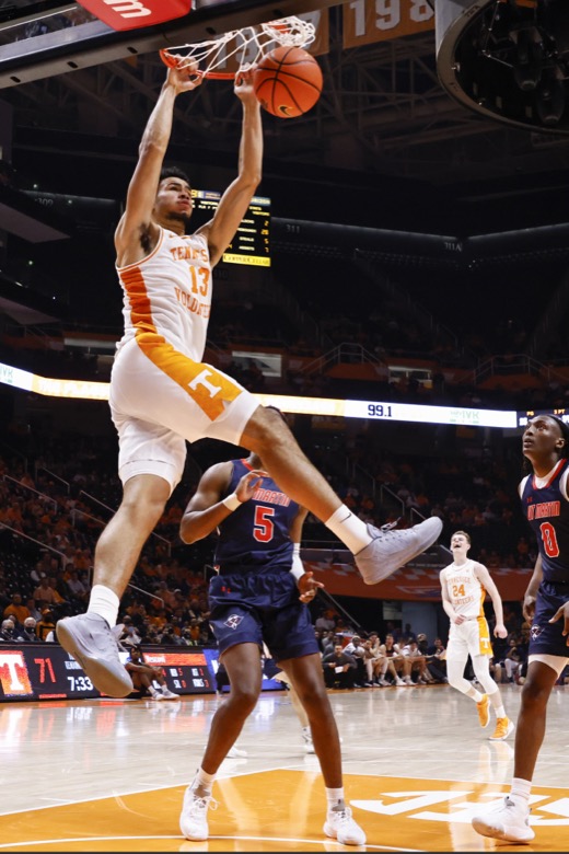 Tennessee forward Olivier Nkamhoua (13) dunks against Tennessee-Martin during an NCAA college basketball game Tuesday, Nov. 9, 2021, in Knoxville, Tenn. Tennessee won 90-62. (AP Photo/Wade Payne)