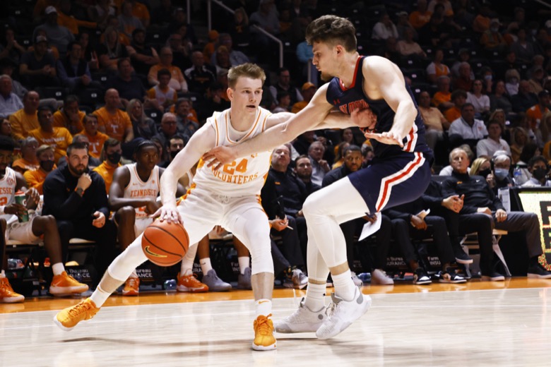 Tennessee guard Justin Powell (24) drives against Tennessee-Martin forward David Didenko (12) during an NCAA college basketball game Tuesday, Nov. 9, 2021, in Knoxville, Tenn. Tennessee won 90-62. (AP Photo/Wade Payne)