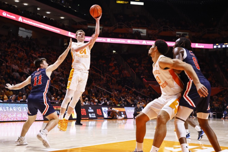 Tennessee guard Justin Powell (24) shoots over Tennessee-Martin guard Grant Hurst (11) during an NCAA college basketball game Tuesday, Nov. 9, 2021, in Knoxville, Tenn. Tennessee won 90-62. (AP Photo/Wade Payne)