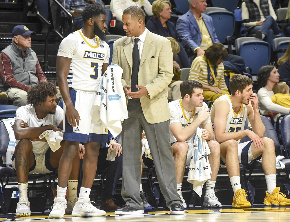 UTC men's basketball coach Lamont Paris and guard David JeanBaptiste