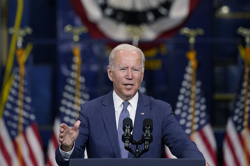 Photo by Evan Vucci of The Associated Press / President Joe Biden delivers remarks at the New Jersey Transit Meadowlands Maintenance Complex to promote his "Build Back Better" agenda on Oct. 25, 2021, in Kearny, N.J.