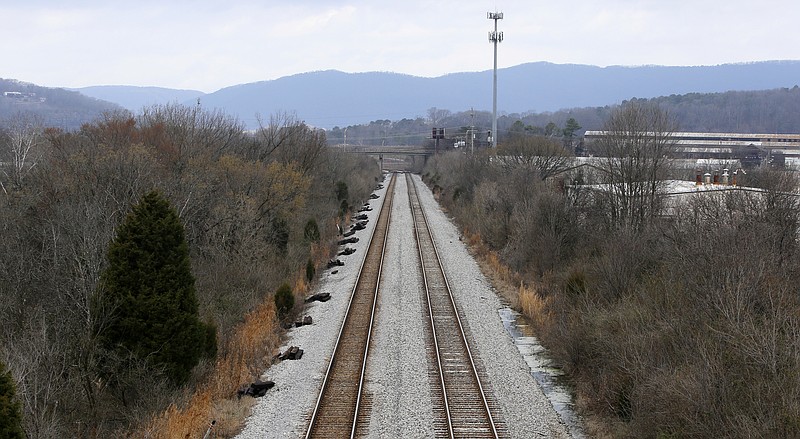 Staff file photo / The railroad tracks that run along Chattanooga Creek are seen looking west from Market Street in the South Broad Street District on Tuesday, Feb. 20, 2018, in Chattanooga, Tenn. A $66 million provision for Amtrak, which could lead to passenger rail service being restored in Chattanooga, is planned for Tennessee under the $1.2 trillion infrastructure bill.