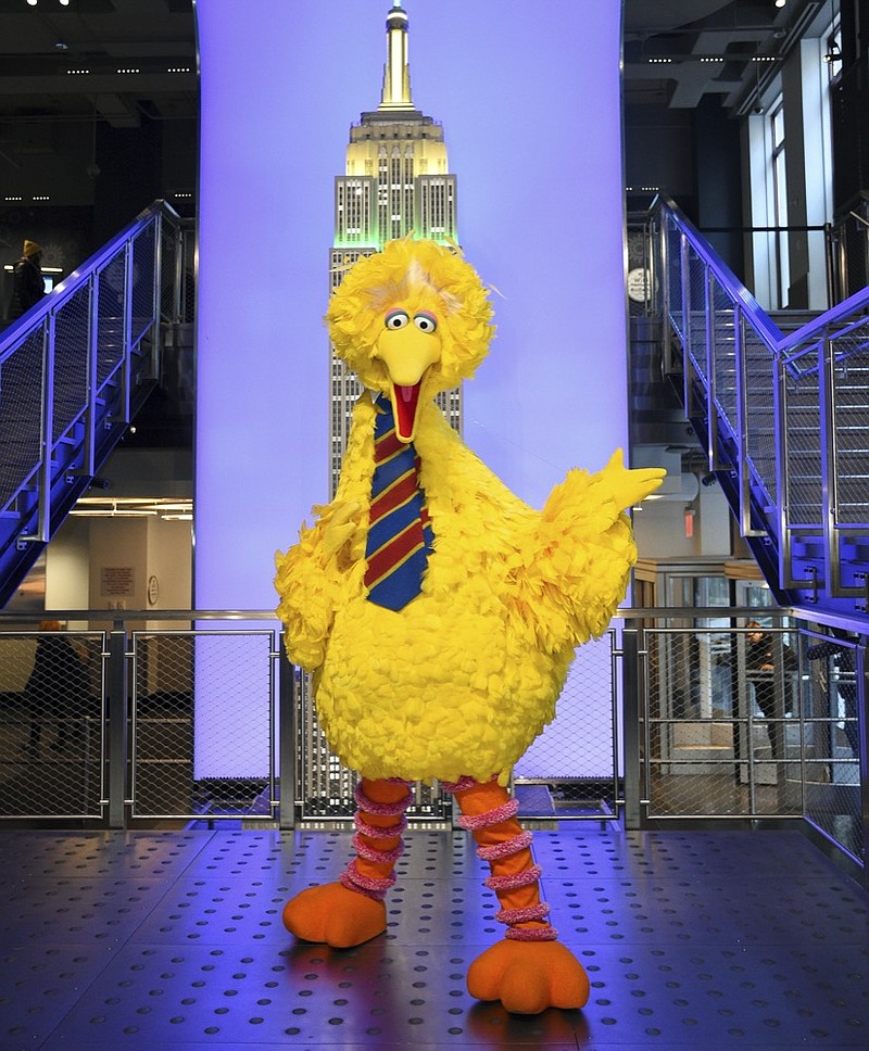 FILE - Sesame Street's Big Bird participates in the ceremonial lighting of the Empire State Building in honor of Sesame Street's 50th anniversary on Friday, Nov. 8, 2019, in New York. (Photo by Evan Agostini/Invision/AP, File)


