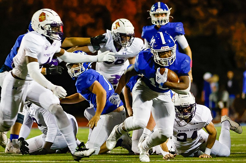 Staff photo by Troy Stolt / McCallie junior running back Ontario Price carries the football during a TSSAA Division II-AAA quarterfinal against visiting Father Ryan on Friday night.