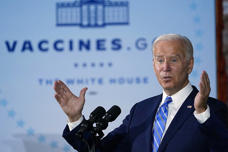 President Joe Biden speaks about COVID-19 vaccinations after touring a Clayco Corporation construction site for a Microsoft data center in Elk Grove Village, Ill., Thursday, Oct. 7, 2021. The Biden administration wants the multiple challenges to its workplace COVID-19 vaccination rule consolidated in a single federal court and has asked for a decision by early next week. The U.S. Department of Justice said in court filings Monday, Nov. 8, 2021 that one of the federal circuit courts should be chosen at random on Nov. 16 to hear the cases. (AP Photo/Susan Walsh, File)