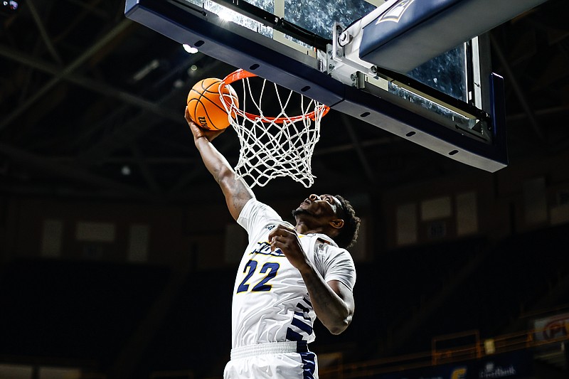 Staff photo by Troy Stolt / Mocs forward Silvio De Sousa (22) lays the ball up during UTC's home basketball game against the Tennessee Tech Golden Eagles at McKenzie Arena on Tuesday, Nov. 16, 2021 in Chattanooga, Tenn.