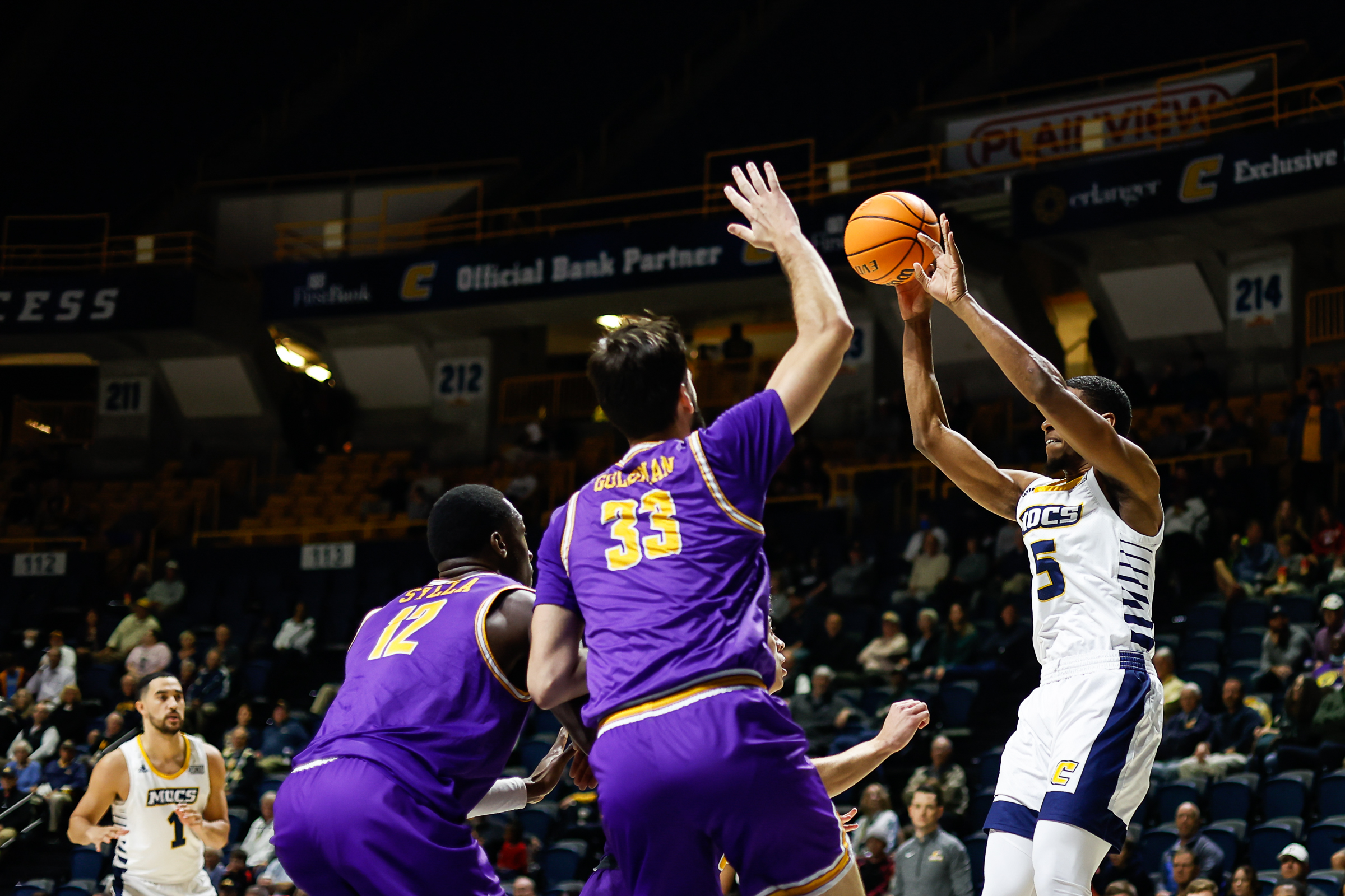 Staff photo by Troy Stolt / Mocs forward Darius Banks (5) tries to pass during UTC's home basketball game against the Tennessee Tech Golden Eagles at McKenzie Arena on Tuesday, Nov. 16, 2021 in Chattanooga, Tenn.