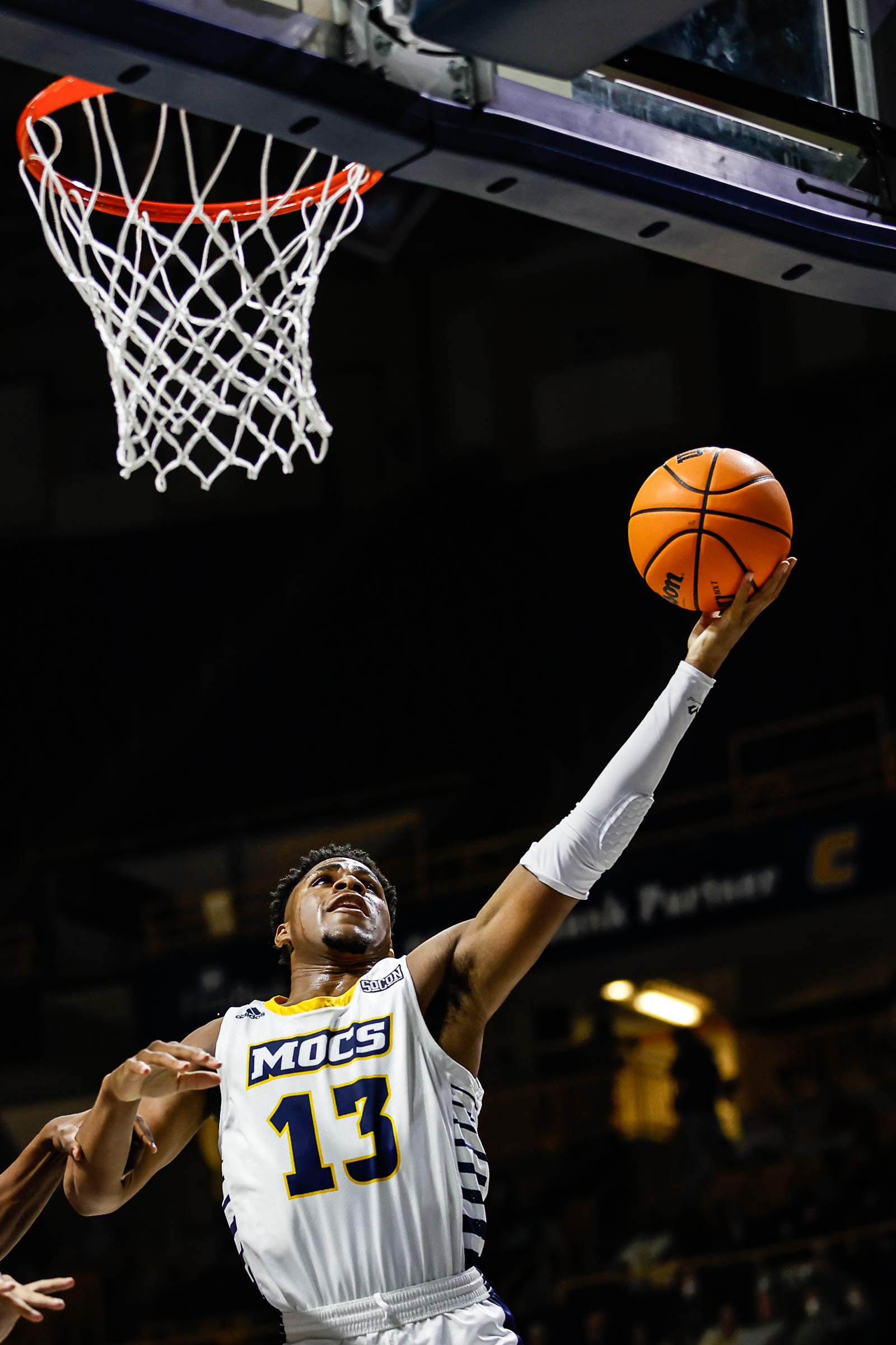 Staff photo by Troy Stolt / Mocs guard Malachi Smith (13) goes for a layup during UTC's home basketball game against the Tennessee Tech Golden Eagles at McKenzie Arena on Tuesday, Nov. 16, 2021 in Chattanooga, Tenn.