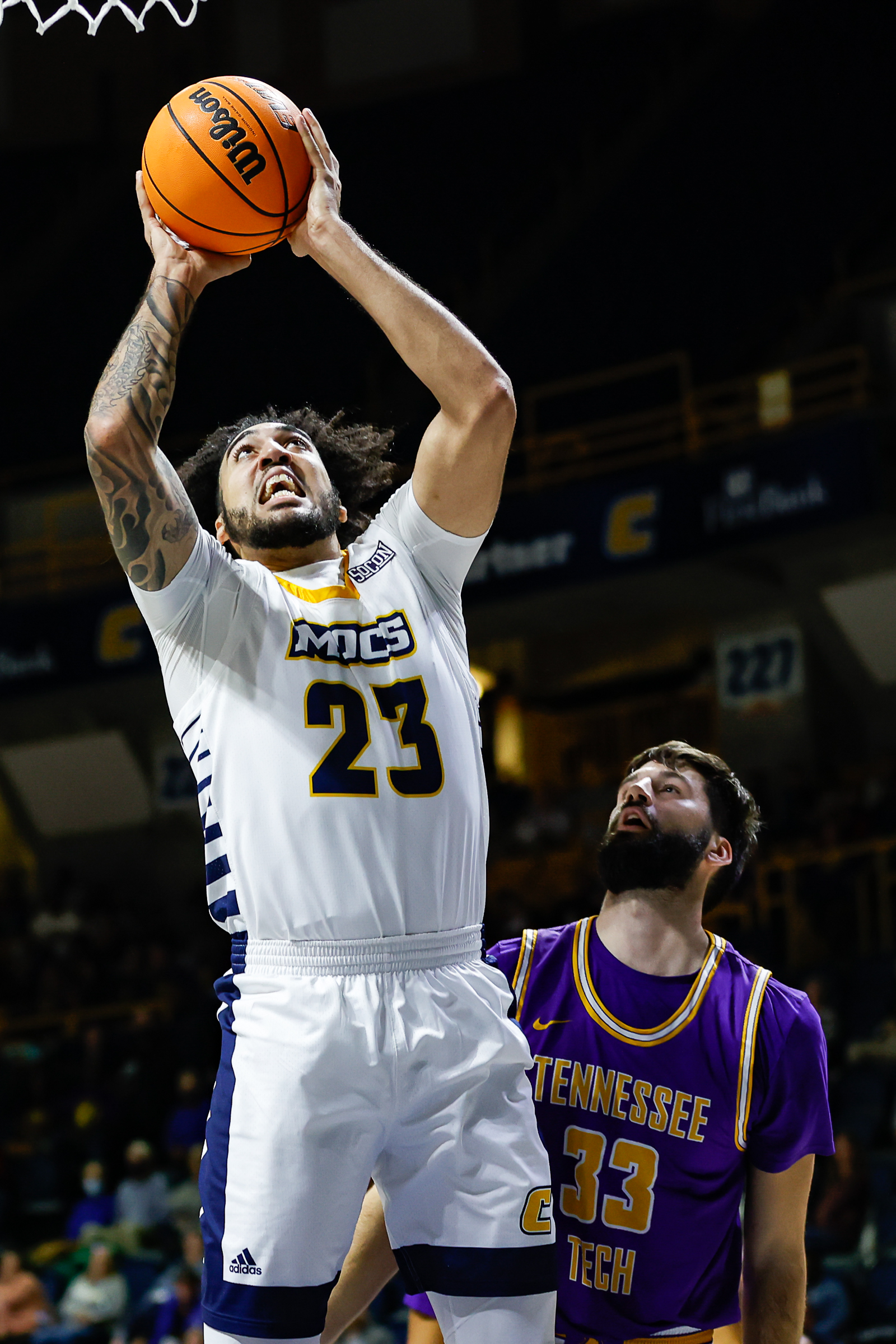 Staff photo by Troy Stolt / Mocs center Avery Diggs (23) goes for a layup during UTC's home basketball game against the Tennessee Tech Golden Eagles at McKenzie Arena on Tuesday, Nov. 16, 2021 in Chattanooga, Tenn.
