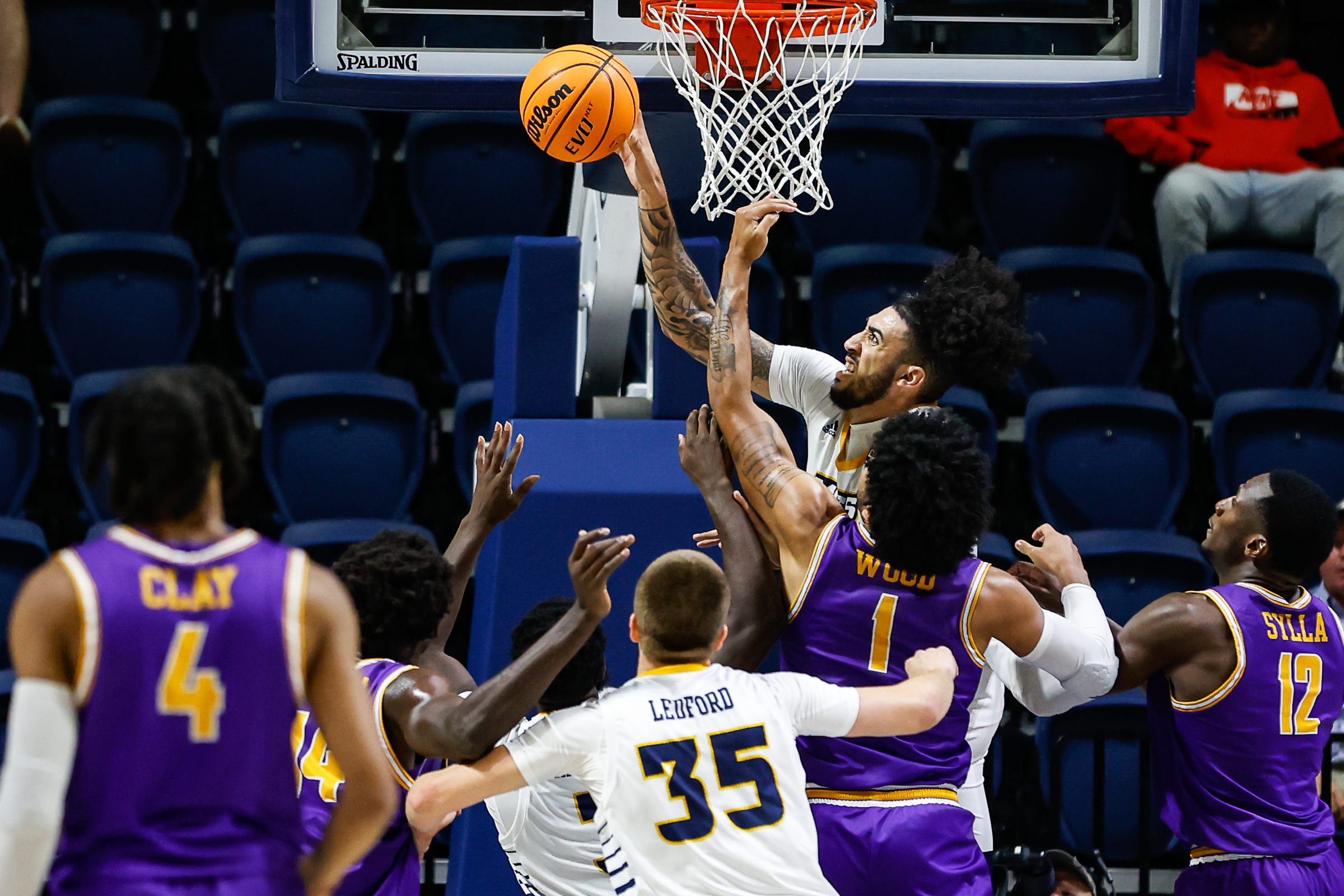 Staff photo by Troy Stolt / Mocs center Avery Diggs (23) blocks a shot during UTC's home basketball game against the Tennessee Tech Golden Eagles at McKenzie Arena on Tuesday, Nov. 16, 2021 in Chattanooga, Tenn.