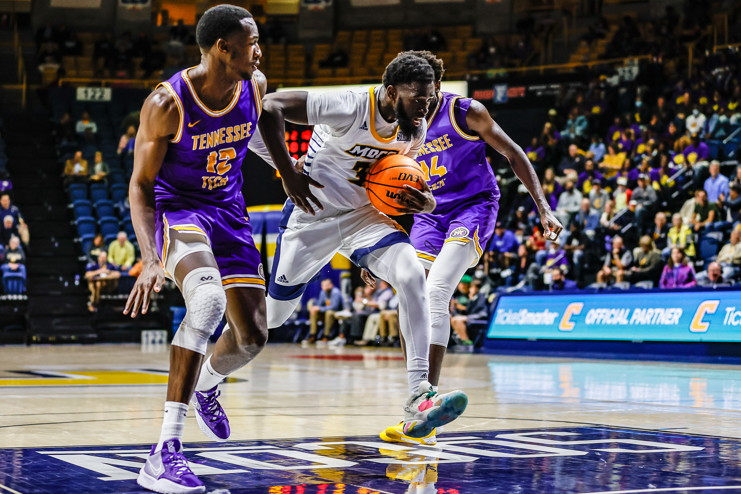 Staff photo by Troy Stolt / Mocs guard David Jean-Baptiste (3) drives to the basket during UTC's home basketball game against the Tennessee Tech Golden Eagles at McKenzie Arena on Tuesday, Nov. 16, 2021 in Chattanooga, Tenn.