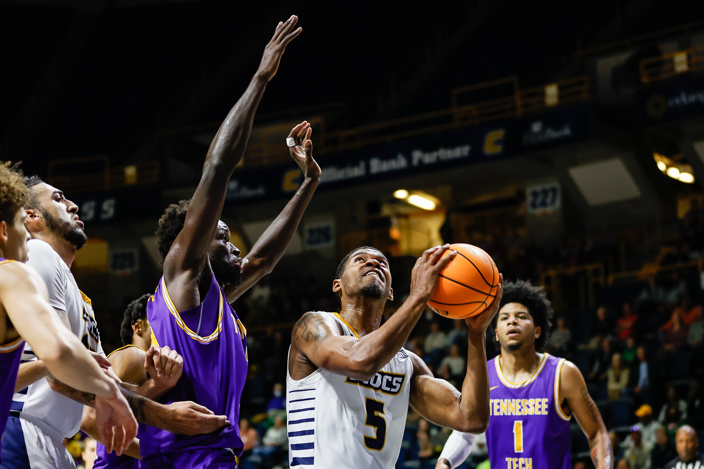 Staff photo by Troy Stolt / Mocs forward Darius Banks (5) goes for a layup during UTC's home basketball game against the Tennessee Tech Golden Eagles at McKenzie Arena on Tuesday, Nov. 16, 2021 in Chattanooga, Tenn.
