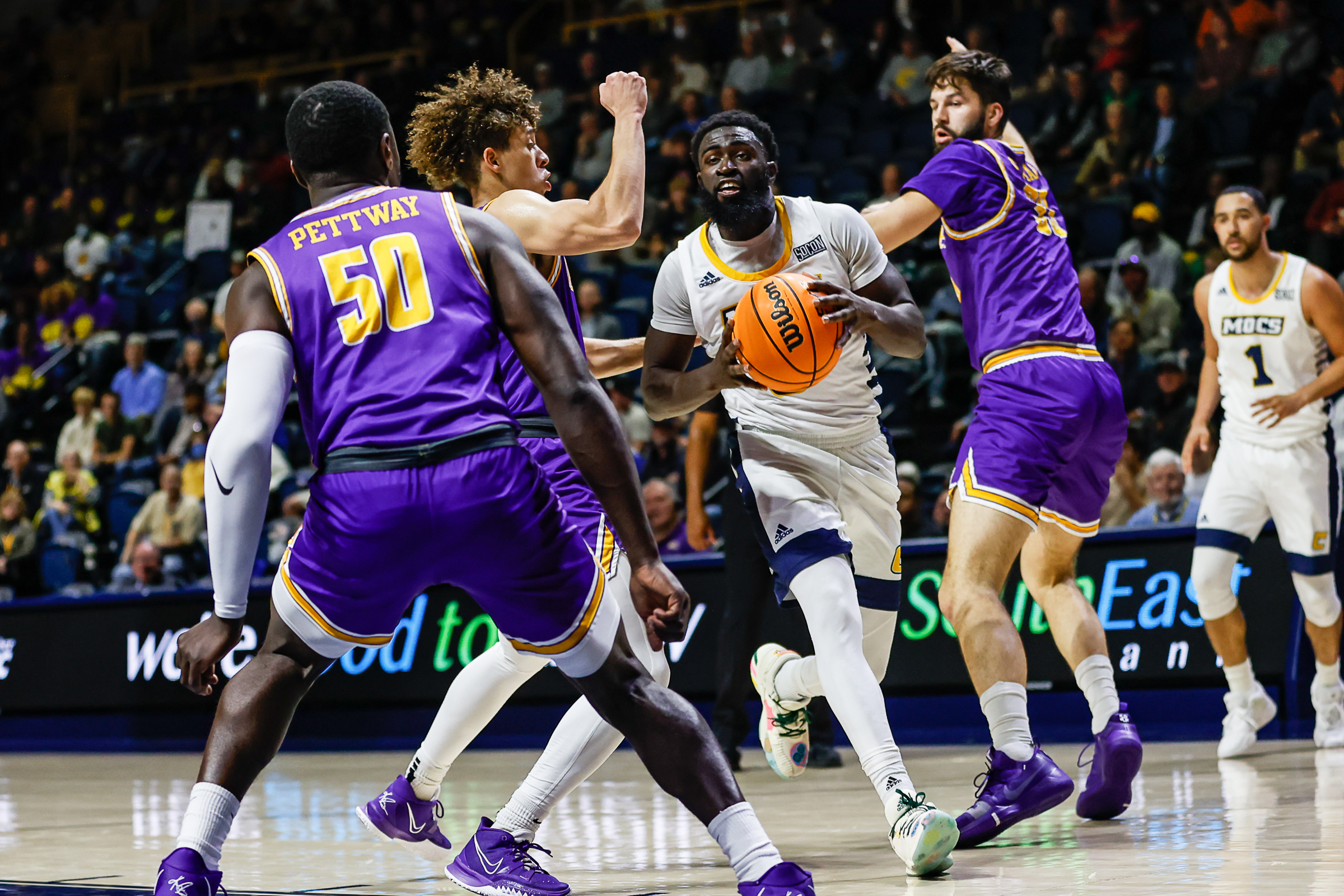 Staff photo by Troy Stolt / Mocs guard David Jean-Baptiste (3) drives to the basket during UTC's home basketball game against the Tennessee Tech Golden Eagles at McKenzie Arena on Tuesday, Nov. 16, 2021 in Chattanooga, Tenn.