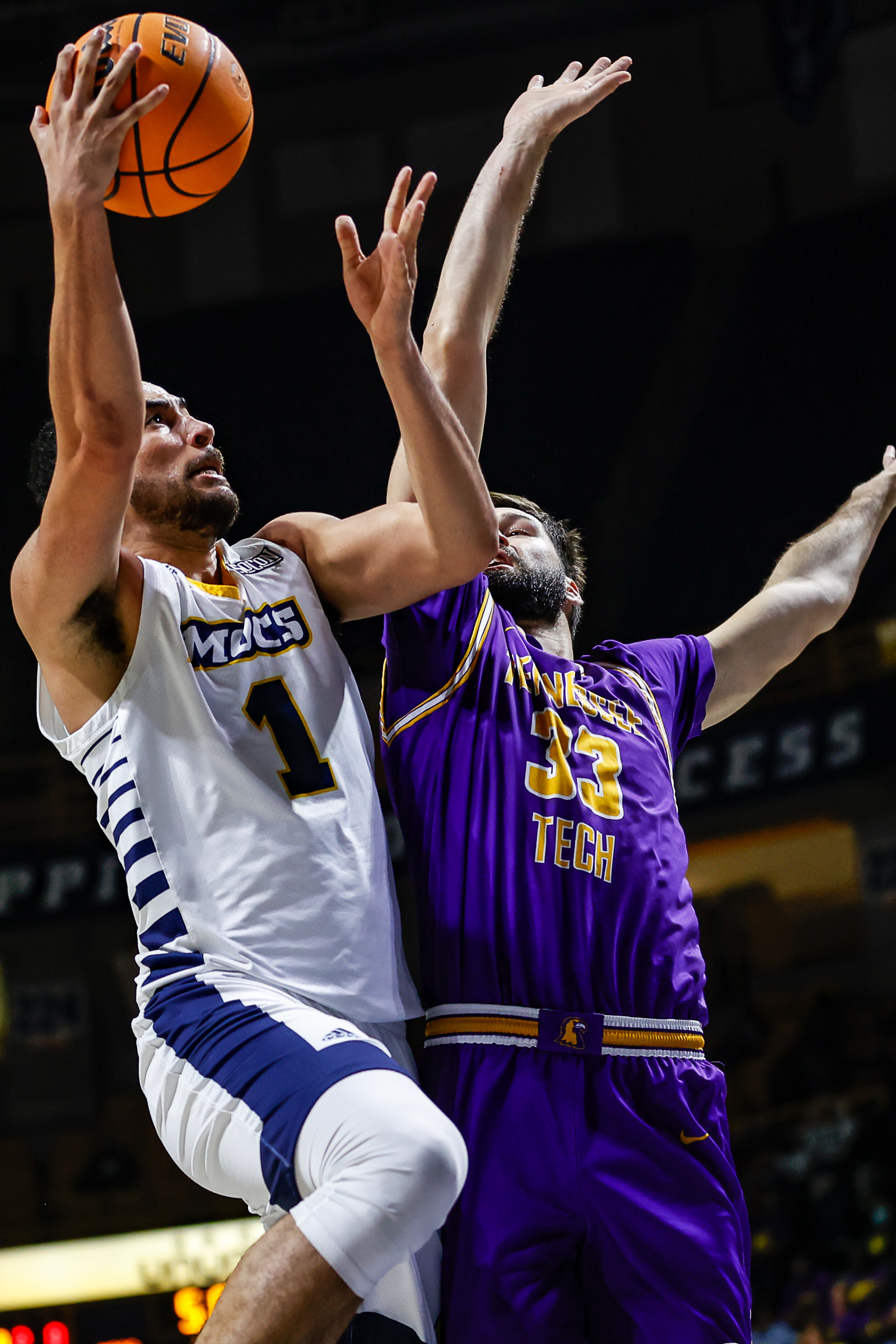 Staff photo by Troy Stolt / Mocs forward KC Hankton (1) goes for a layup during UTC's home basketball game against the Tennessee Tech Golden Eagles at McKenzie Arena on Tuesday, Nov. 16, 2021 in Chattanooga, Tenn.