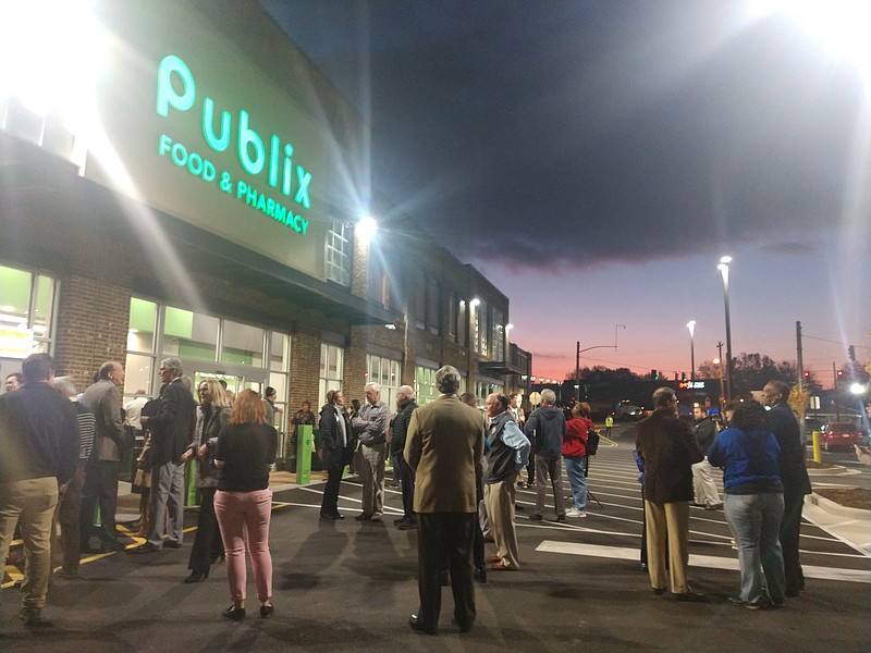 Staff photo by Mike Pare / Shoppers, officials and others showed up early Wednesday morning, Nov. 17, 2021, for the opening of the Publix supermarket at 3535 Broad St.