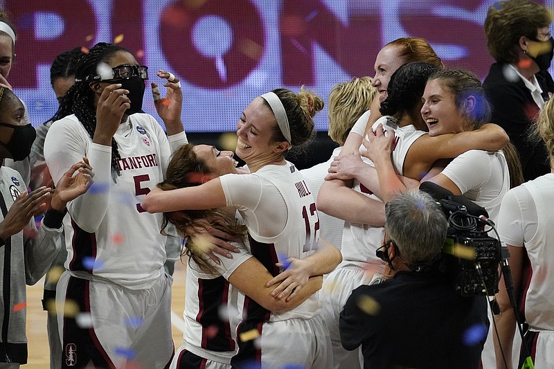 AP photo by Eric Gay / The Stanford women's basketball team celebrates after beating Arizona 54-53 to win last season's NCAA tournament on April 4 at the Alamodome in San Antonio.