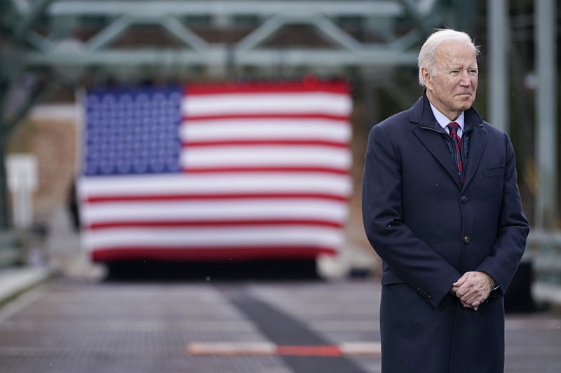 President Joe Biden waits to speak during a visit to the NH 175 bridge over the Pemigewasset River to promote infrastructure spending Tuesday, Nov. 16, 2021, in Woodstock, N.H. (AP Photo/Evan Vucci)


