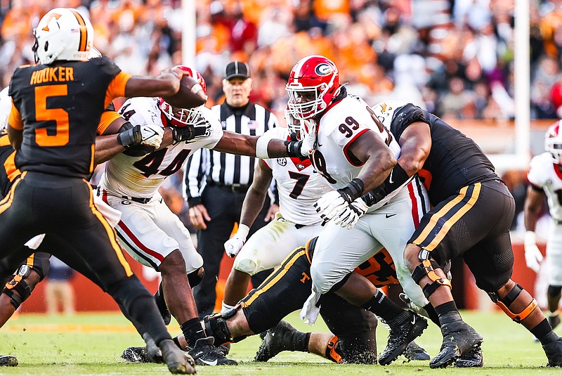Georgia photo by Tony Walsh / Georgia nose tackle Jordan Davis breaks through Tennessee's offensive line last Saturday afternoon to set his sights on Volunteers quarterback Hendon Hooker.