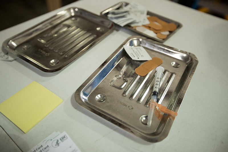 Staff photo by Troy Stolt / A syringe containing a dose of the COVID-19 vaccine is seen during vaccination hours at the Meigs County EMA headquarters on Tuesday, March 30, 2021.