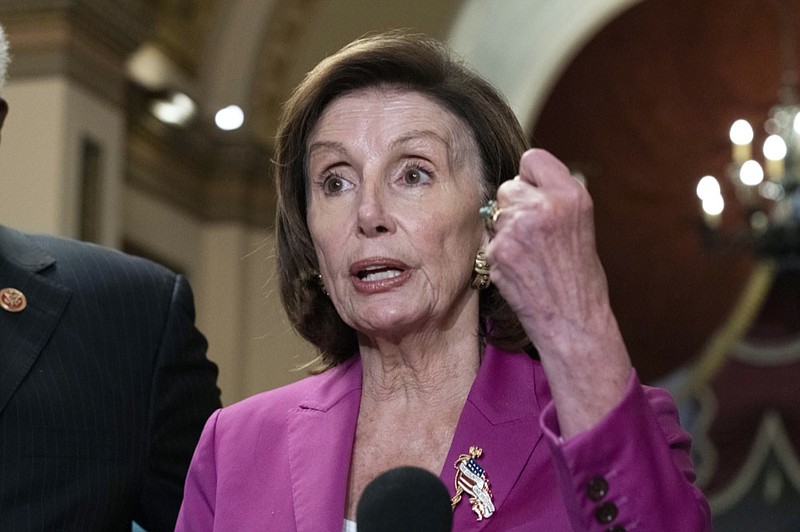 FILe - Speaker of the House Nancy Pelosi, D-Calif., talks to reporters after day of delays in the vote to advance President Joe Biden's domestic policy package, at the Capitol in Washington, on Nov. 5, 2021. (AP Photo/Jose Luis Magana, File)


