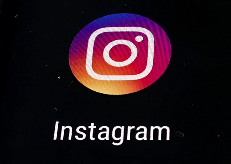 FILE - In this Nov. 29, 2018, file photo, the Instagram app logo is displayed on a mobile screen in Los Angeles. (AP Photo/Damian Dovarganes, File)


