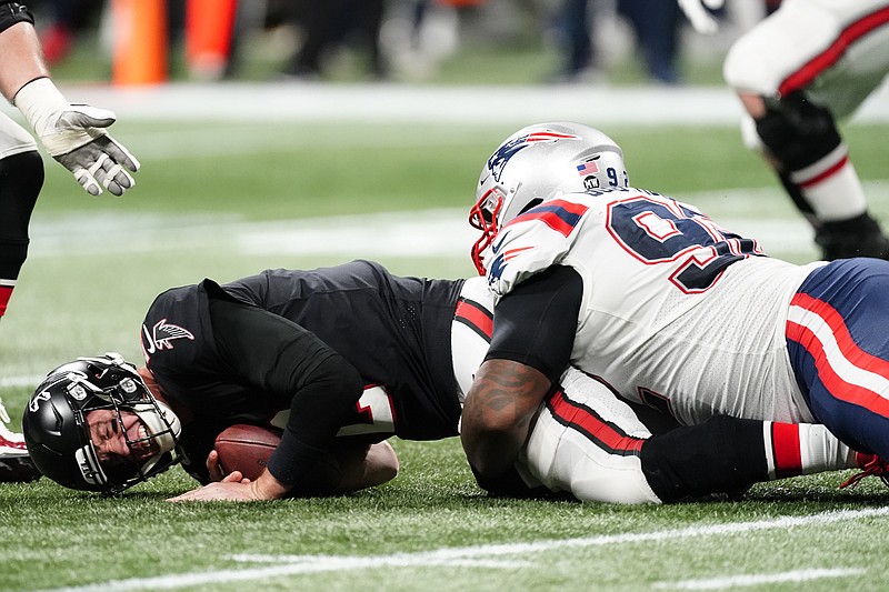 AP photo by John Bazemore / Atlanta Falcons quarterback Matt Ryan is sacked by New England Patriots nose tackle Davon Godchaux during the second half of Thursday night's game in Atlanta.