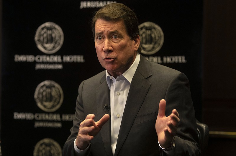 AP file photo by Sebastian Scheiner / U.S. Sen. Bill Hagerty gestures as he speaks during an interview with The Associated Press in May.