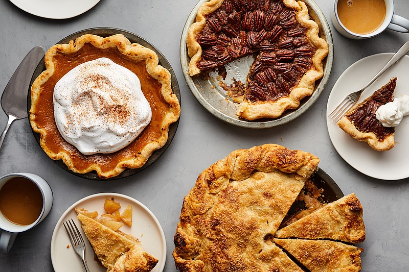Clockwise from left, ultimate pumpkin pie, maple-honey-pecan pie and classic apple pie. For the best pies, skip the actual pumpkin, increase the pecans and precook your apples. / Photo by Ryan Liebe/The New York Times