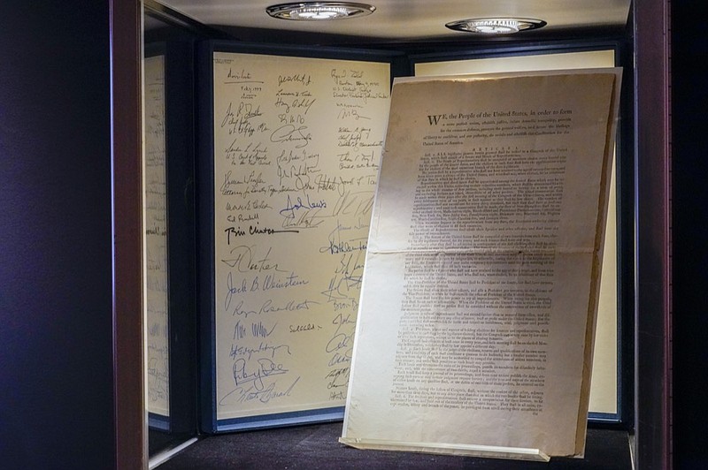 FILE - A first printing of the United States Constitution is displayed at Sotheby's auction house during a press preview on Nov. 5, 2021, in New York. The rare copy has sold on Nov. 18 for a record $43.2 million at Sotheby's to an anonymous buyer who outbid a group of crypocurrency investors. (AP Photo/Mary Altaffer, File)


