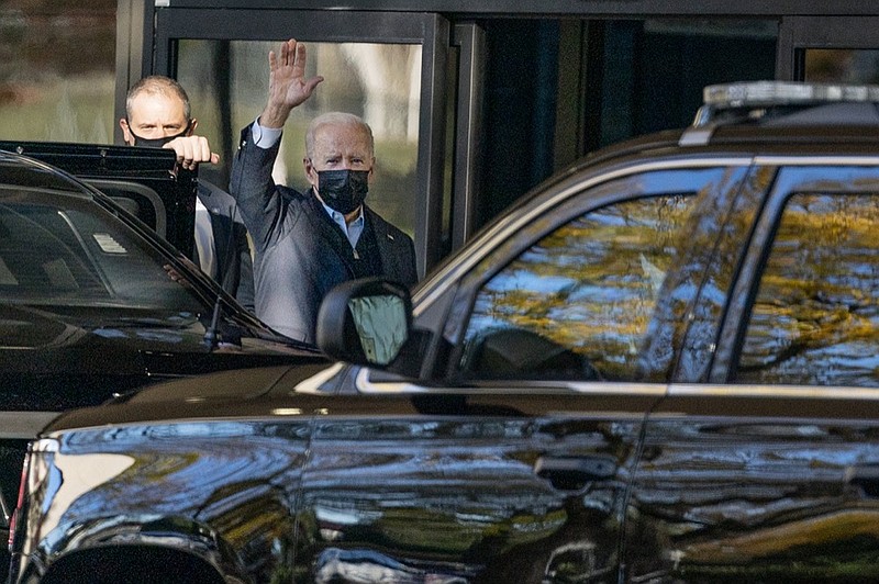 President Joe Biden arrives at Walter Reed National Military Medical Center for a physical exam, Friday, Nov. 19, 2021, in Bethesda, Md. (AP Photo/Evan Vucci)


