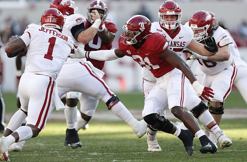 Crimson Tide photos / Alabama sophomore outside linebacker Will Anderson (31) racked up 11 tackles and 3.5 tackles for loss as the Crimson Tide clinched the SEC West title with Saturday's 42-35 outlasting of Arkansas.