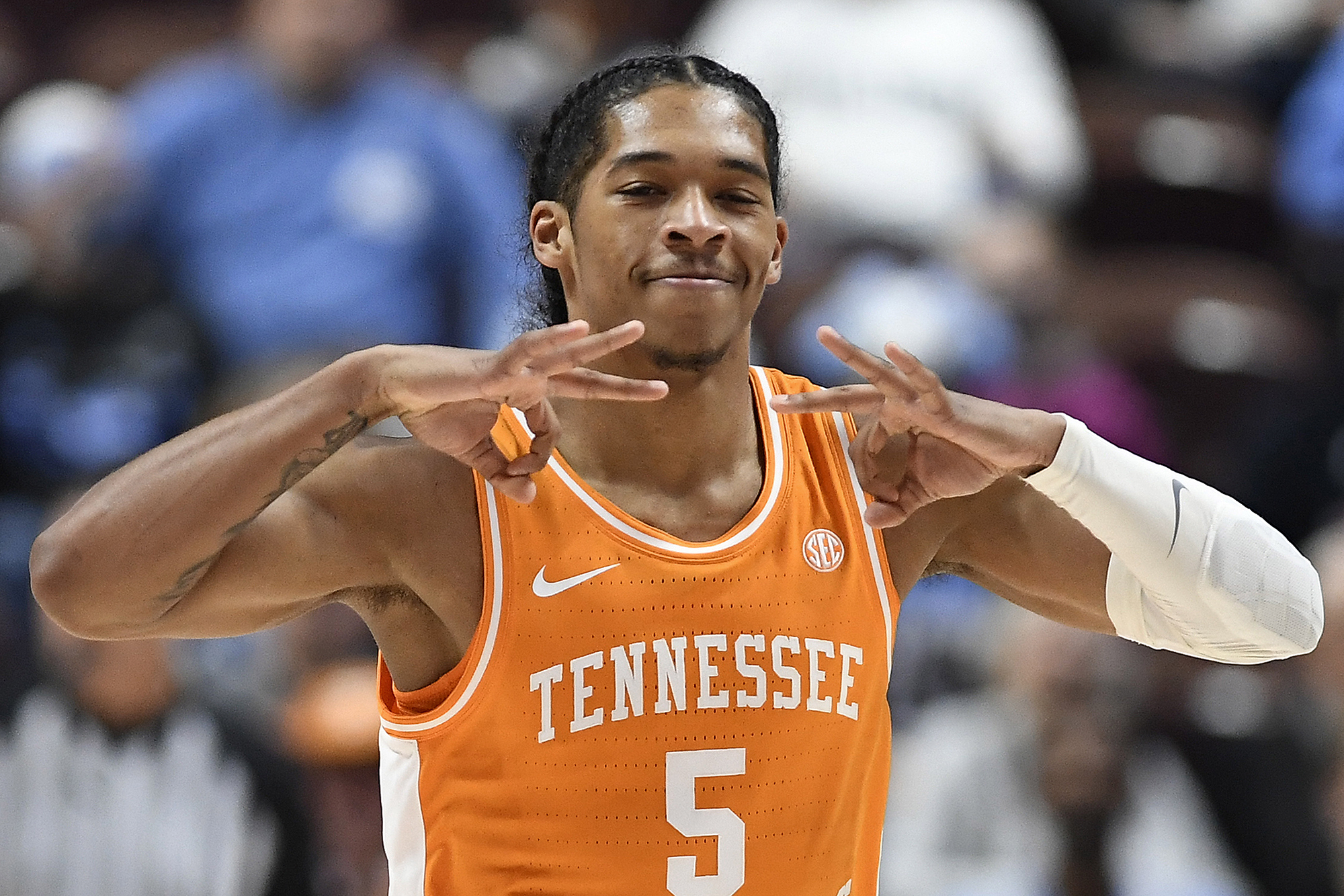 AP photo by Jessica Hill / Tennessee point guard Zakai Zeigler celebrates after making a 3-pointer against North Carolina during the consolation game of the Hall of Fame Tip-Off Tournament on Sunday in Uncasville, Conn.