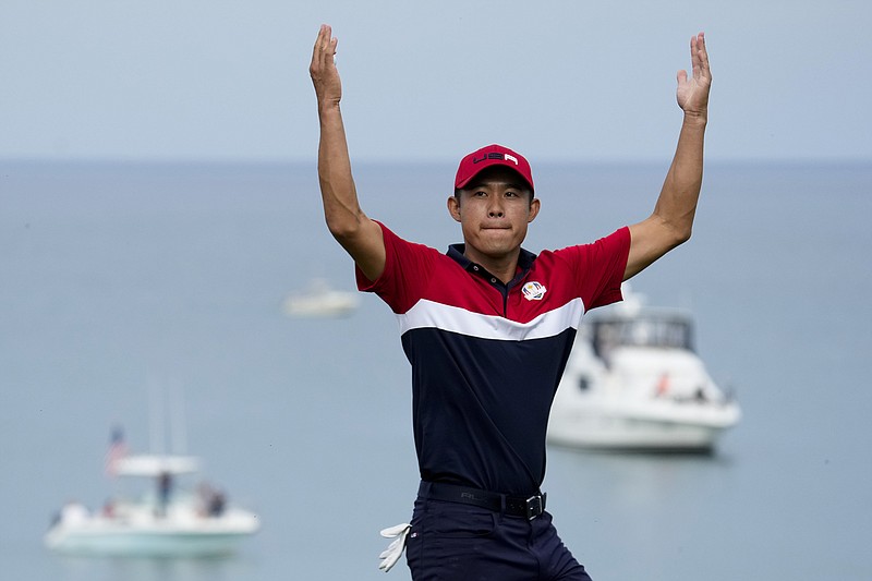 AP photo by Ashley Landis / Collin Morikawa celebrates while competing for the United States in the Ryder Cup singles matches on Sept. 26 in Sheboygan, Wis. On Sunday, Morikawa won the DP World Tour Championship in Dubai to became the first American to finish a year with the points lead on the European Tour.