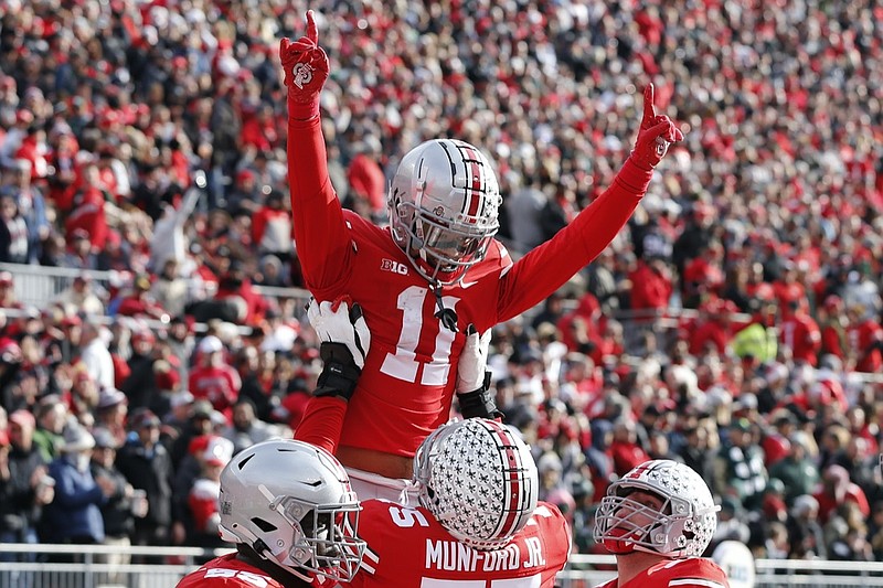 Ohio State receiver Jaxon Smith-Njigba celebrates his touchdown against Michigan State during the first half of an NCAA college football game Saturday, Nov. 20, 2021, in Columbus, Ohio. (AP Photo/Jay LaPrete)