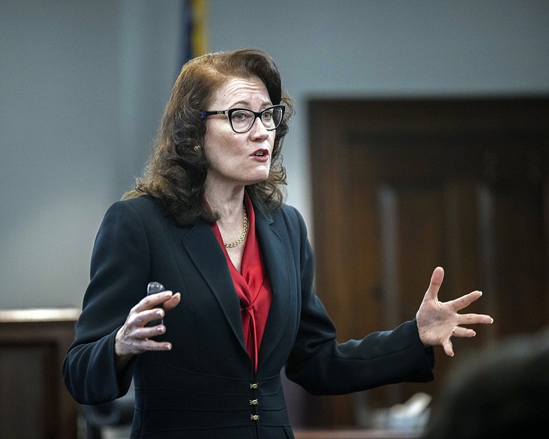 Prosecutor Linda Dunikoski presents a closing argument to the jury during the trial of Travis McMichael, his father, Gregory McMichael, and William "Roddie" Bryan, at the Glynn County Courthouse, Monday, Nov. 22, 2021, in Brunswick, Ga. The three men charged with the February 2020 slaying of 25-year-old Ahmaud Arbery. (AP Photo/Stephen B. Morton, Pool)