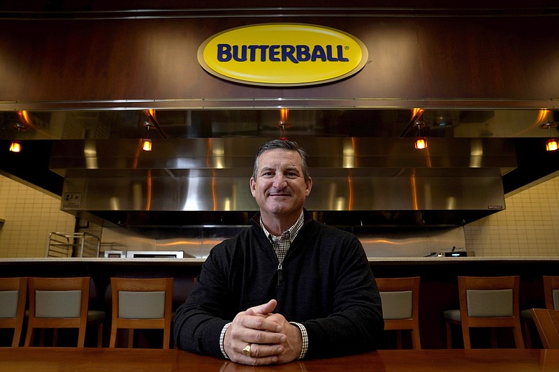 Butterball President and CEO Jay Jandrain poses at the company's corporate headquarters in Garner, N.C., Friday, Nov. 19, 2021. Butterball, which supplies around one-third of Thanksgiving turkeys, struggled to attract workers earlier this year, leading to processing delays. But Jandrain said labor shortages have lessened and the company was able to secure enough trucks to get its turkeys to grocery stores. (AP Photo/Gerry Broome)