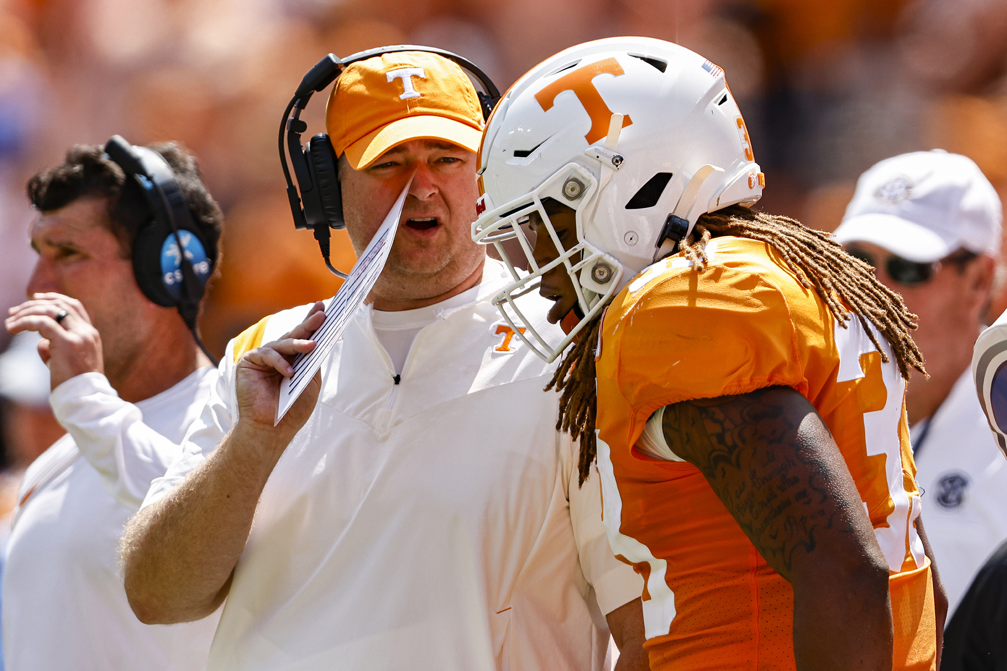 AP photo by Wade Payne / Tennessee football coach Josh Heupel talks to Jeremy Banks after the linebacker was flagged for unnecessary roughness during the first half of a Sept. 11 game against Pittsburgh in Knoxville.