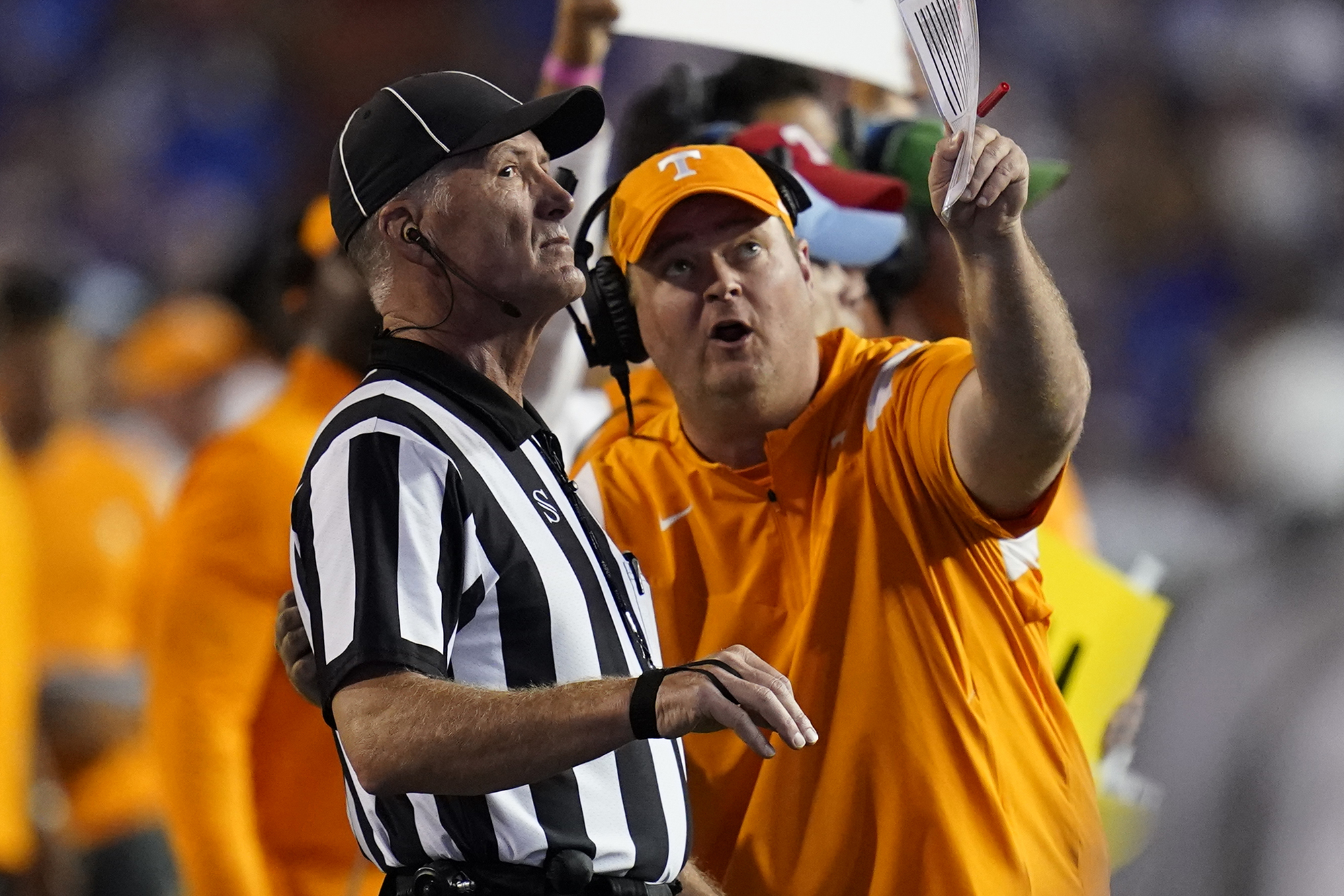 AP photo by John Raoux / Tennessee football coach Josh Heupel speaks with an official during the first half of the Vols' game at Florida on Sept. 25.