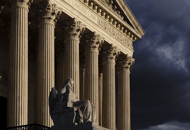 FILE - The Supreme Court is seen at dusk in Washington, Oct. 22, 2021. (AP Photo/J. Scott Applewhite, File)