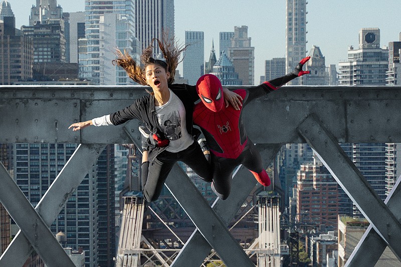 MJ (Zendaya) and Spider-Man (Tom Holland) jump off a bridge in "Spider-Man: No Way Home." / Photo by Matt Kennedy/Sony Pictures/TNS
