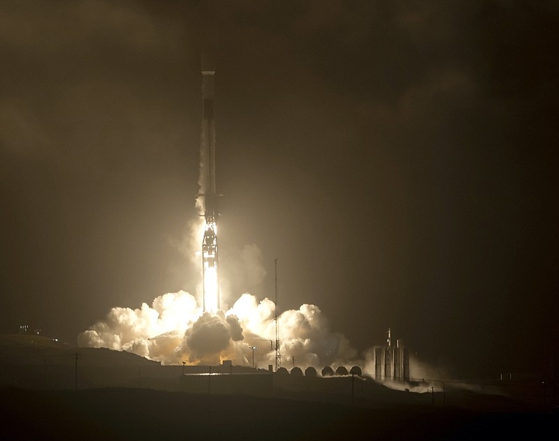 The SpaceX Falcon 9 rocket launches with the Double Asteroid Redirection Test, or DART, spacecraft onboard, Tuesday, Nov. 23, 2021, Pacific time (Nov. 24 Eastern time) from Space Launch Complex 4E, at Vandenberg Space Force Base in Calif. NASA launched the spacecraft on a mission to smash into an asteroid and test whether it would be possible to knock a speeding space rock off course if one were to threaten Earth. (Bill Ingalls/NASA via AP)


