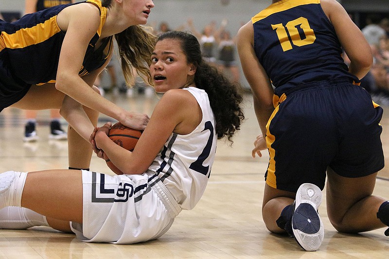 Staff file photo by Erin O. Smith / Soddy-Daisy's Jada Trimiar, center, was one of three players who scored 12 points to help the Lady Trojans overcome a 12-point halftime deficit and beat Tyner on Wednesday at Chattanooga Christian School's Thanksgiving tournament.